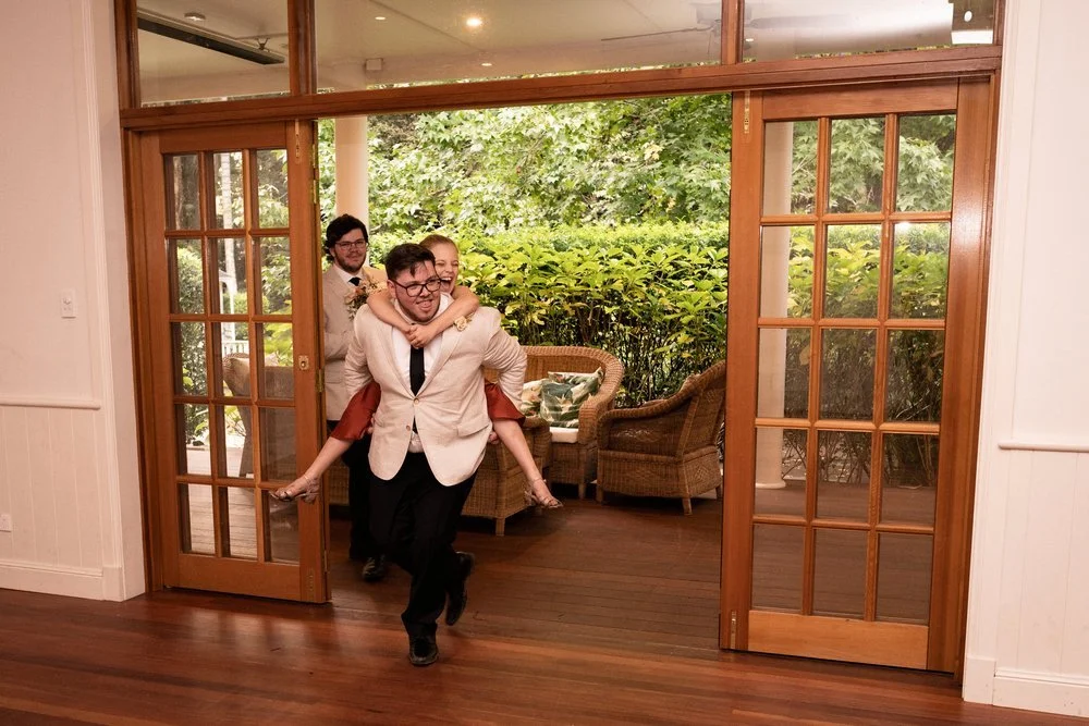 A grand entrance through the timber doors. Tamara & Sam's wedding at Kantara House, Central Coast