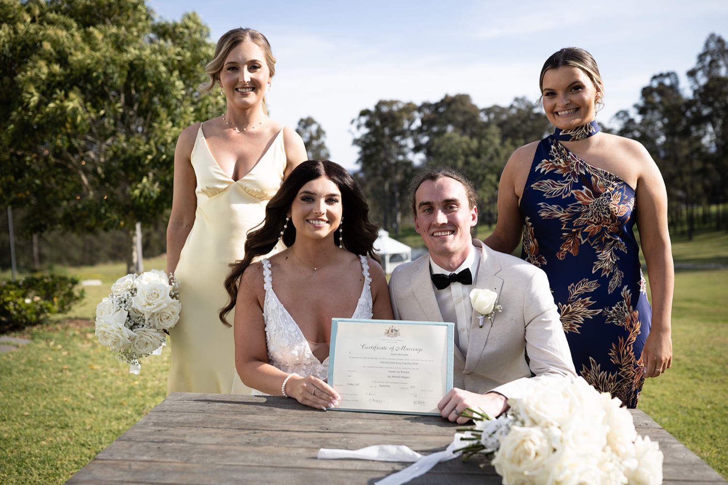 Signing the register on the lawn. Tianah & Zac's wedding at White Barn, Hunter Valley