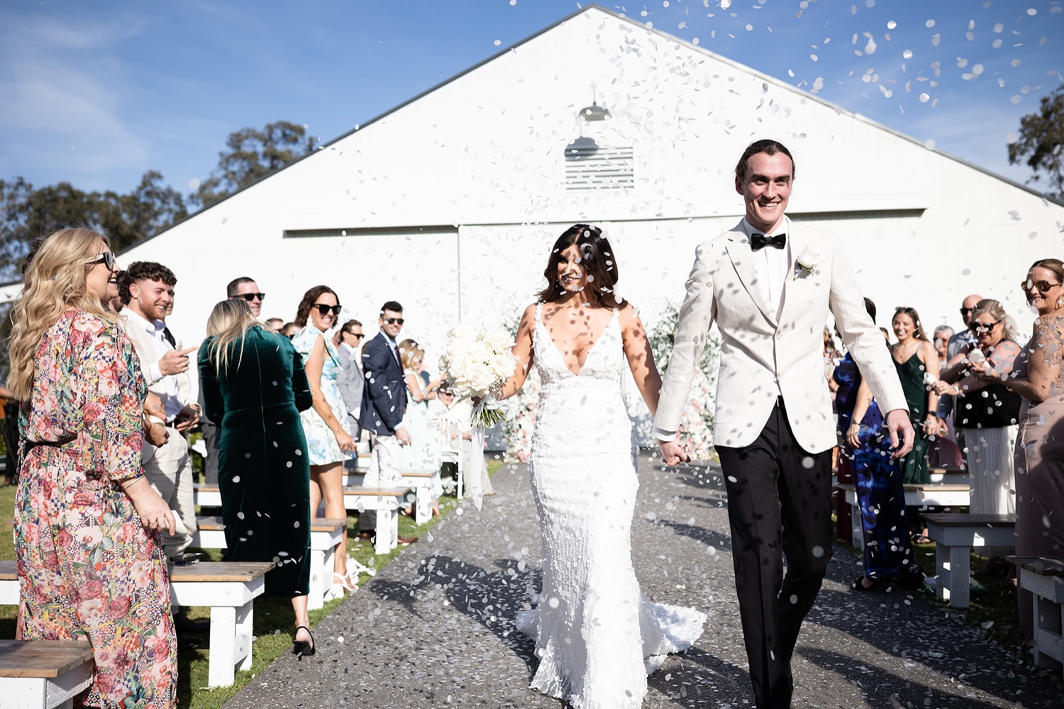 Walking back down the aisle outside the White Barn. Tianah & Zac's wedding at White Barn, Hunter Valley