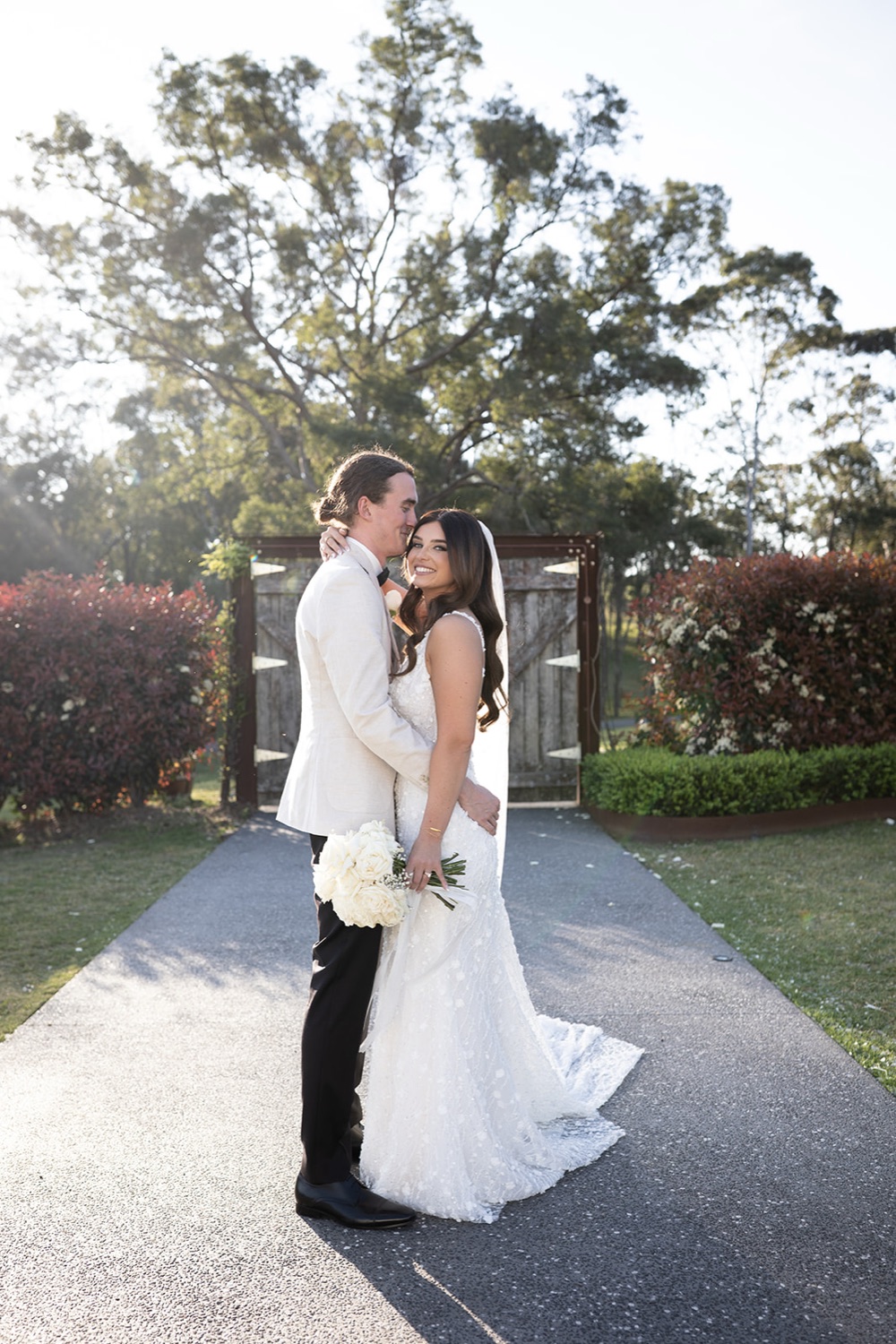 A kiss under the trees. Wedding at White Barn, Hunter Valley