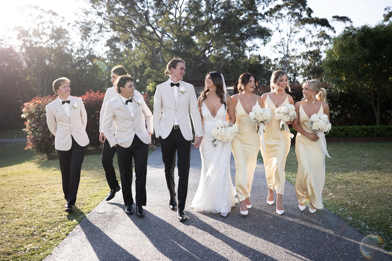 The wedding party on the lawn. Tianah & Zac's wedding at White Barn, Hunter Valley