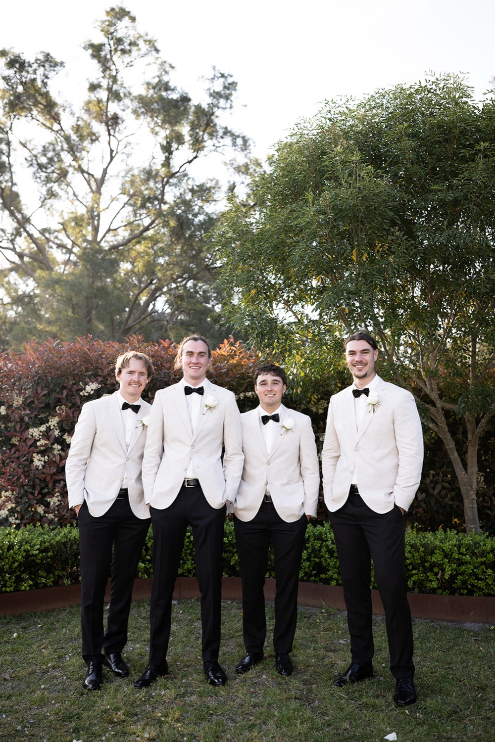 The wedding party in white dinner jackets. Tianah & Zac's wedding at White Barn, Hunter Valley
