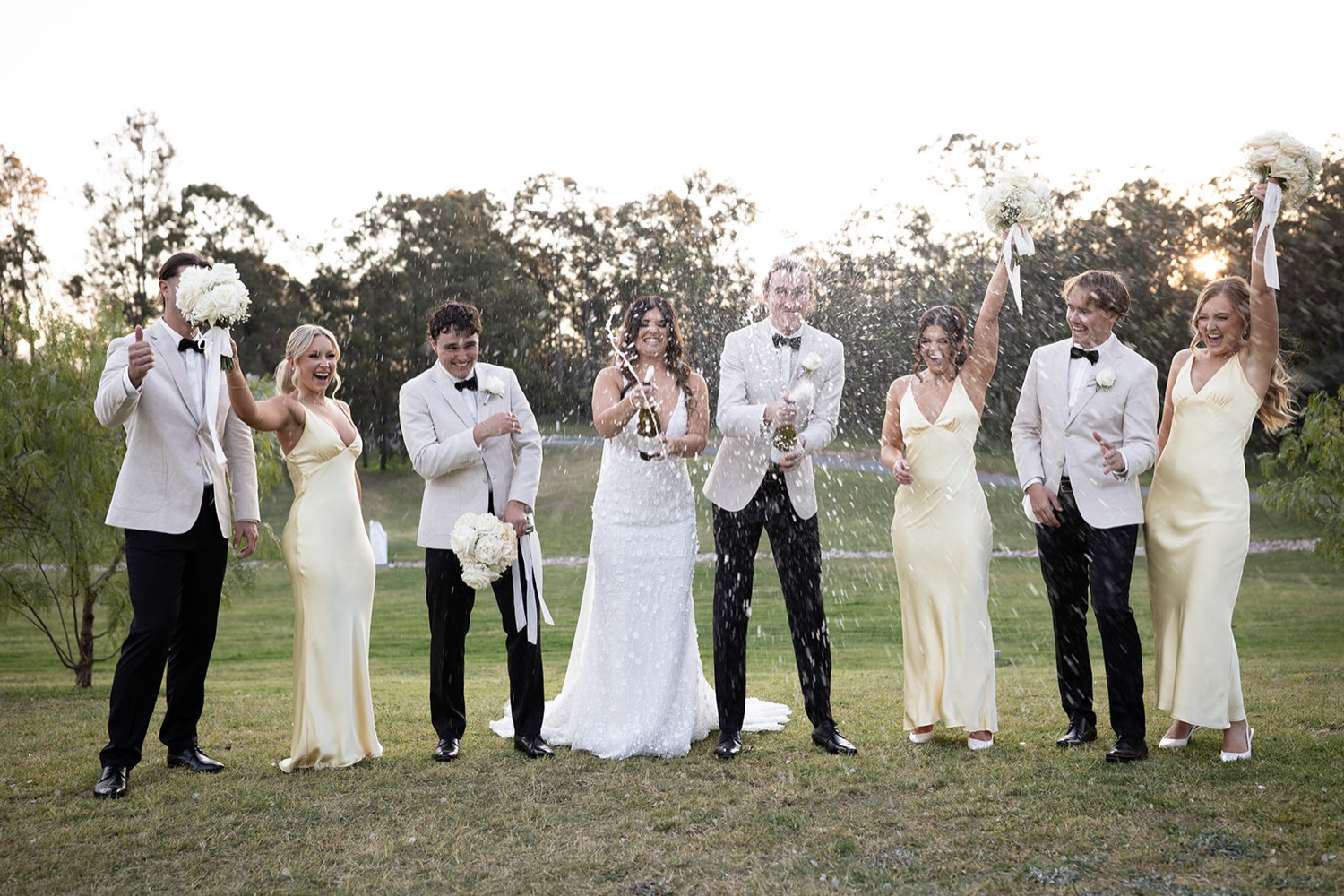 The wedding party cheering. Tianah & Zac's wedding at White Barn, Hunter Valley