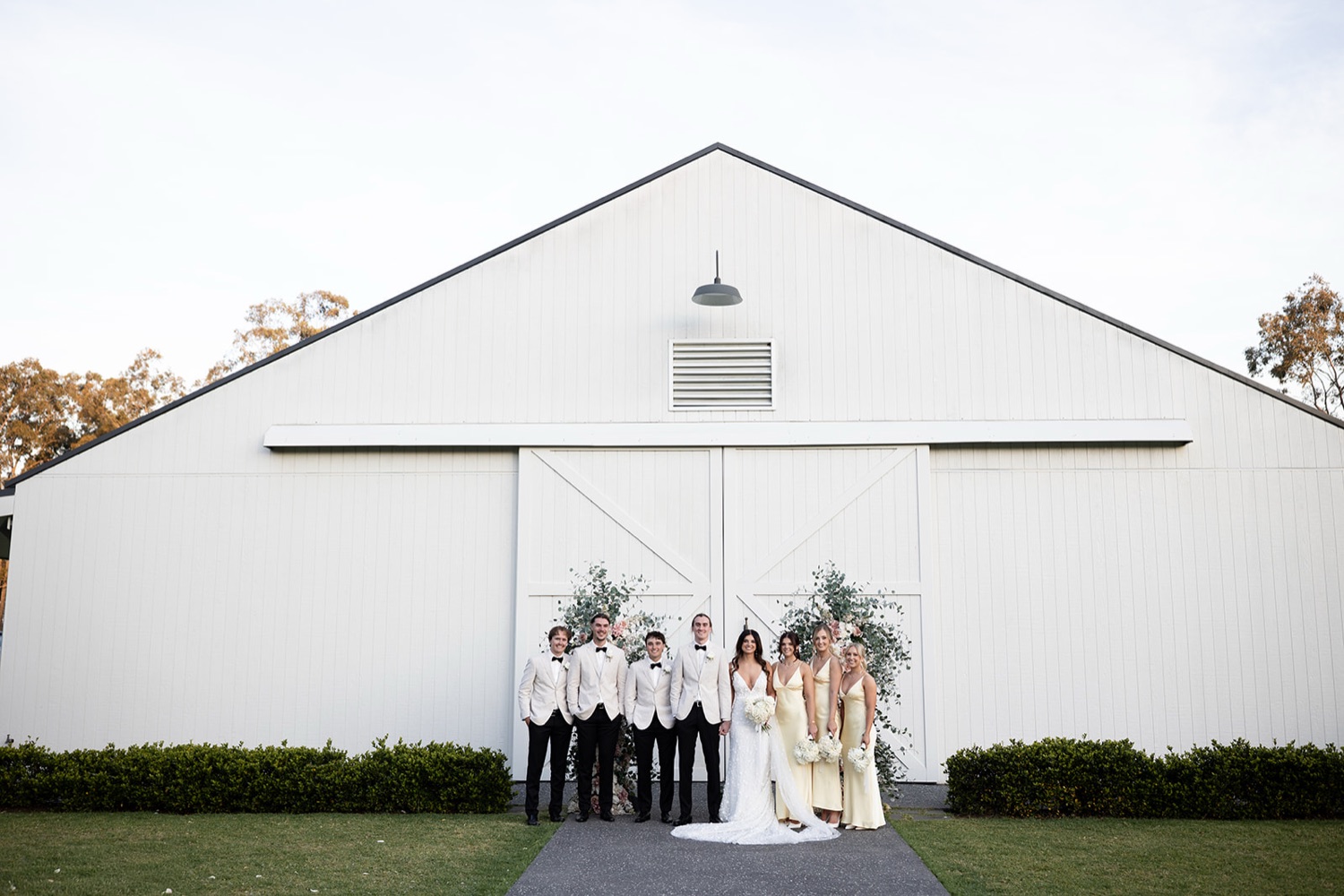 The wedding party in front of the White Barn. Tianah & Zac's wedding at White Barn, Hunter Valley