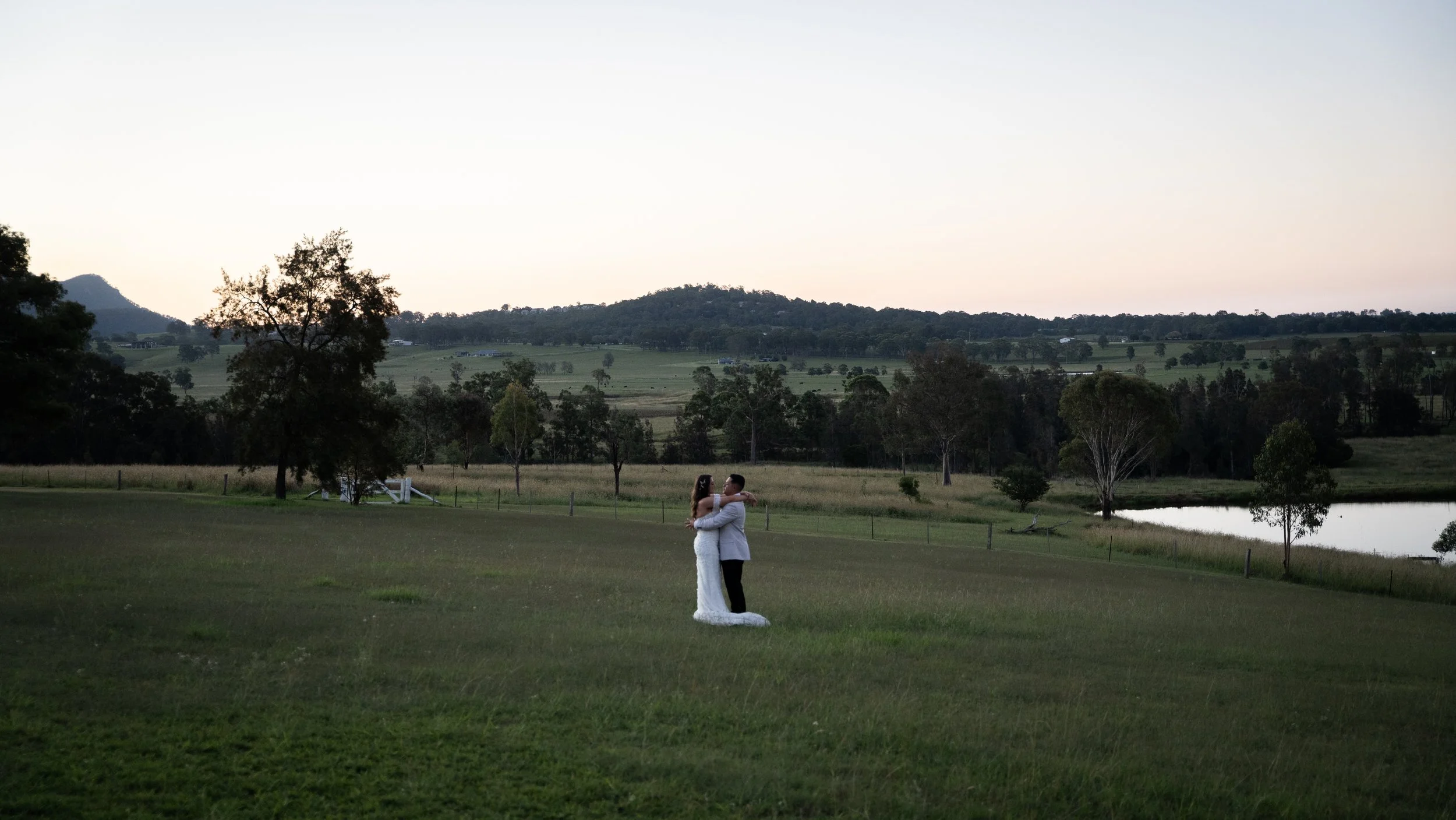 The couple in a valley at dusk