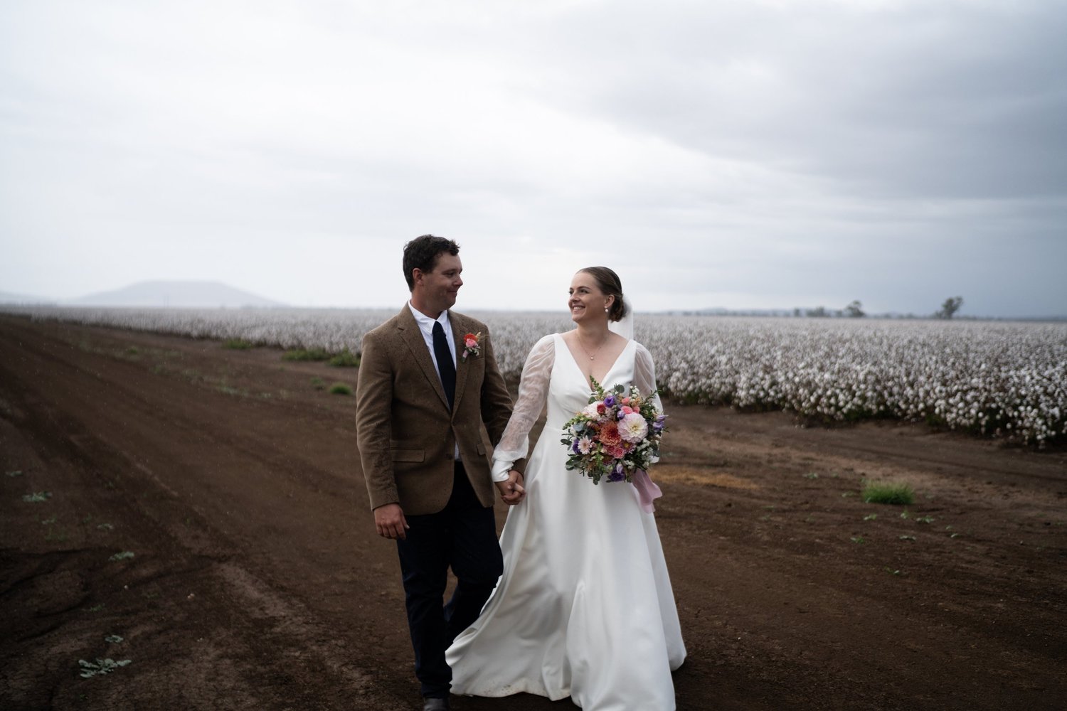 The couple in a cotton field. 's wedding at unknown, unknown