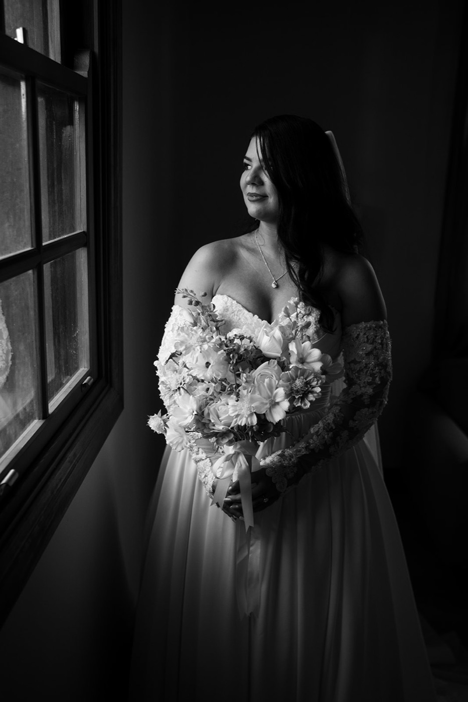 Portrait by the window, in black and white. Isabelle & Aidan's wedding at Enzo, Hunter Valley