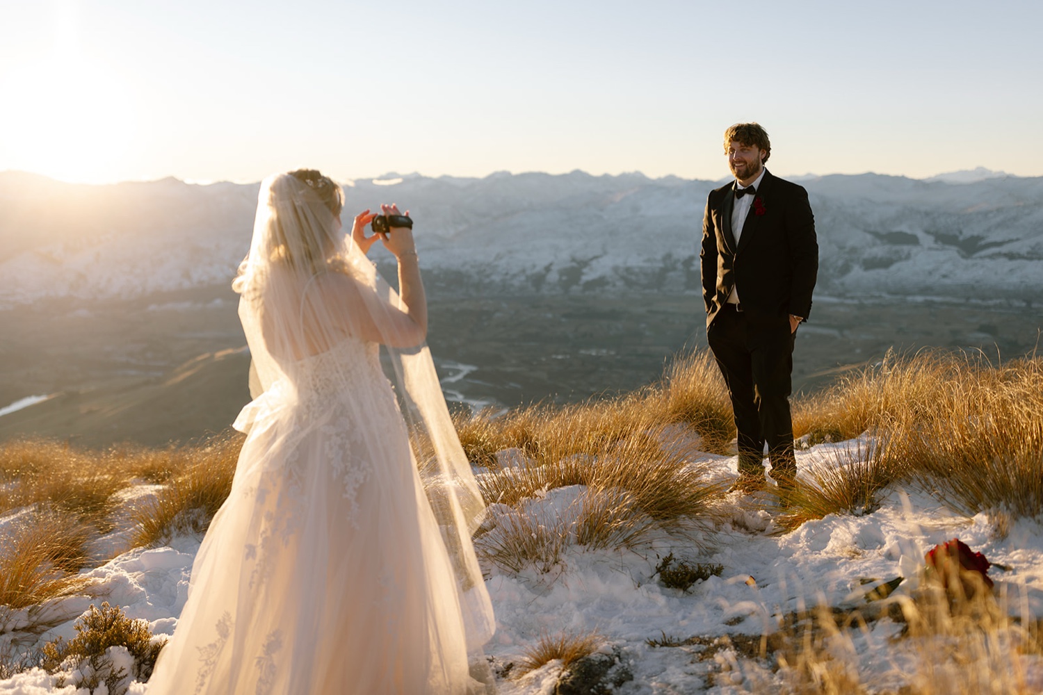 Casey filming Chris on a snowy mountain top